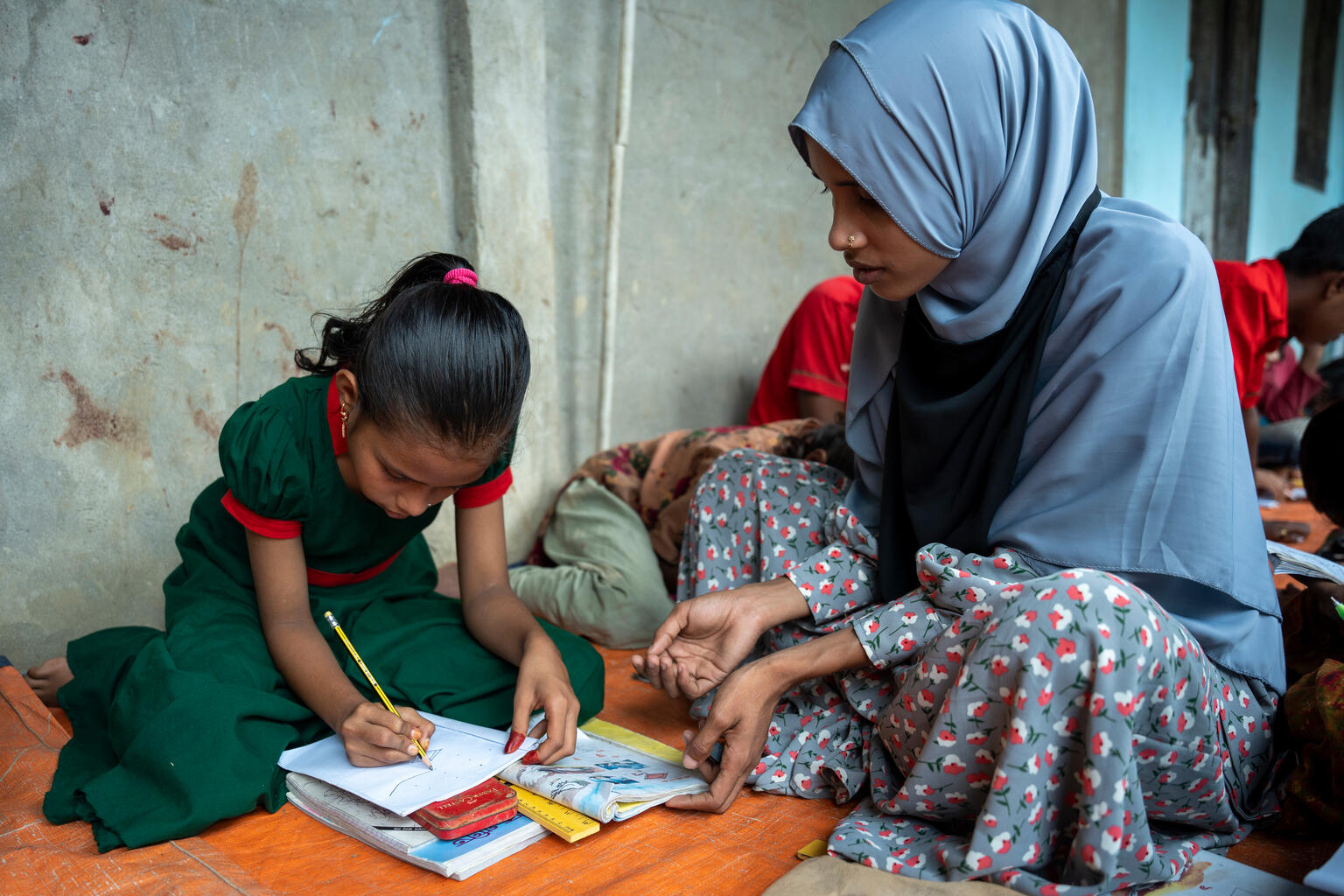 Tawhida hat im UNICEF Lernzentrum gelernt, zu schreiben und zu rechnen.